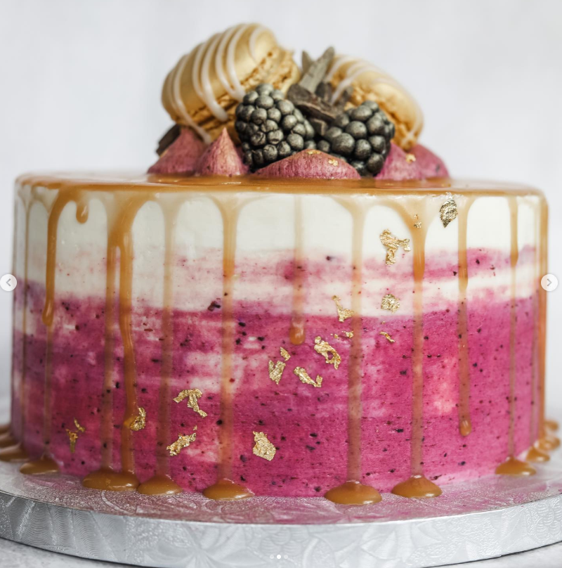 Magenta berry ombré cake with salted caramel drip and gold leaf